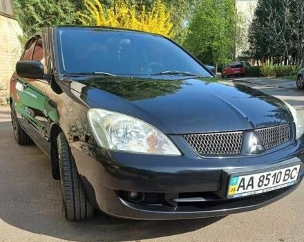 Чорний Міцубісі Lancer, об'ємом двигуна 0.16 л та пробігом 240 тис. км за 4900 $, фото 1 на Automoto.ua