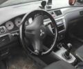 Черный Мицубиси Лансер, объемом двигателя 1.58 л и пробегом 140 тыс. км за 2999 $, фото 4 на Automoto.ua