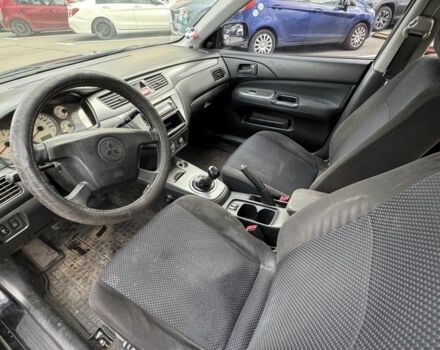 Черный Мицубиси Лансер, объемом двигателя 0 л и пробегом 319 тыс. км за 2700 $, фото 3 на Automoto.ua