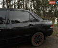 Чорний Міцубісі Lancer, об'ємом двигуна 1.58 л та пробігом 210 тис. км за 3900 $, фото 8 на Automoto.ua