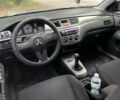Чорний Міцубісі Lancer, об'ємом двигуна 1.6 л та пробігом 240 тис. км за 4599 $, фото 9 на Automoto.ua