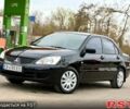 Черный Мицубиси Лансер, объемом двигателя 1.6 л и пробегом 265 тыс. км за 4800 $, фото 1 на Automoto.ua