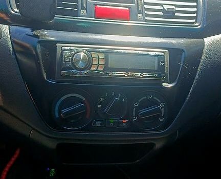 Черный Мицубиси Лансер, объемом двигателя 1.6 л и пробегом 238 тыс. км за 4300 $, фото 4 на Automoto.ua