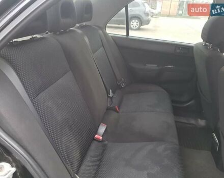 Чорний Міцубісі Lancer, об'ємом двигуна 1.58 л та пробігом 290 тис. км за 3200 $, фото 15 на Automoto.ua