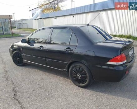 Чорний Міцубісі Lancer, об'ємом двигуна 1.58 л та пробігом 290 тис. км за 3200 $, фото 4 на Automoto.ua