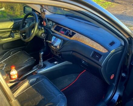 Чорний Міцубісі Lancer, об'ємом двигуна 1.6 л та пробігом 330 тис. км за 4500 $, фото 6 на Automoto.ua