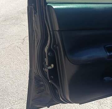 Чорний Міцубісі Lancer, об'ємом двигуна 1.6 л та пробігом 240 тис. км за 3900 $, фото 6 на Automoto.ua