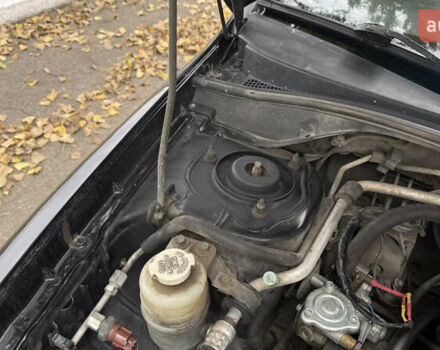 Чорний Міцубісі Lancer, об'ємом двигуна 1.58 л та пробігом 386 тис. км за 4450 $, фото 24 на Automoto.ua