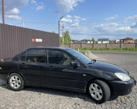 Чорний Міцубісі Lancer, об'ємом двигуна 1.6 л та пробігом 226 тис. км за 4700 $, фото 2 на Automoto.ua