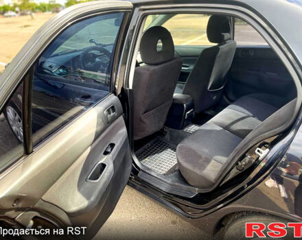 Мицубиси Лансер 2006 в Николаеве на Automoto.ua Черный Мицубиси Лансер, объемом двигателя 1.6 л и пробегом 260 тыс. км за 4999 $, фото 7 на Automoto.ua