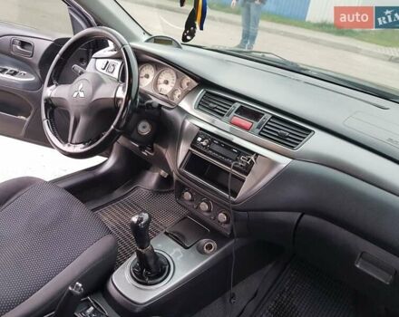 Чорний Міцубісі Lancer, об'ємом двигуна 1.58 л та пробігом 290 тис. км за 3200 $, фото 12 на Automoto.ua