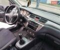 Чорний Міцубісі Lancer, об'ємом двигуна 1.58 л та пробігом 290 тис. км за 3200 $, фото 12 на Automoto.ua