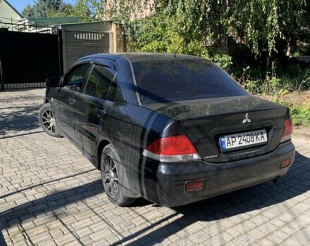 Чорний Міцубісі Lancer, об'ємом двигуна 1.6 л та пробігом 300 тис. км за 4200 $, фото 2 на Automoto.ua