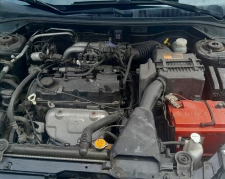 Черный Мицубиси Лансер, объемом двигателя 1.6 л и пробегом 260 тыс. км за 3800 $, фото 8 на Automoto.ua