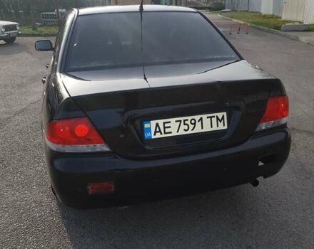 Чорний Міцубісі Lancer, об'ємом двигуна 1.58 л та пробігом 290 тис. км за 3200 $, фото 5 на Automoto.ua