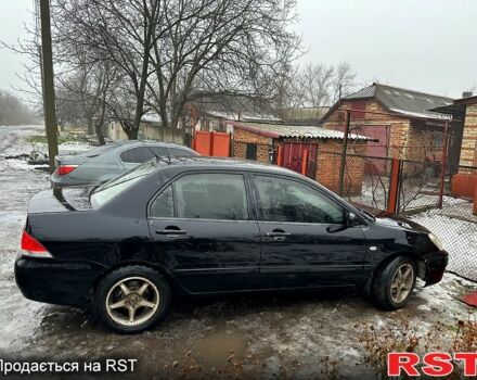 Чорний Міцубісі Lancer, об'ємом двигуна 1.6 л та пробігом 213 тис. км за 4000 $, фото 2 на Automoto.ua