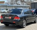 Черный Мицубиси Лансер, объемом двигателя 1.6 л и пробегом 280 тыс. км за 4490 $, фото 4 на Automoto.ua