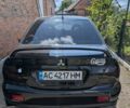 Чорний Міцубісі Lancer, об'ємом двигуна 2 л та пробігом 167 тис. км за 3700 $, фото 1 на Automoto.ua