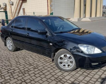 Чорний Міцубісі Lancer, об'ємом двигуна 0.16 л та пробігом 279 тис. км за 4500 $, фото 2 на Automoto.ua