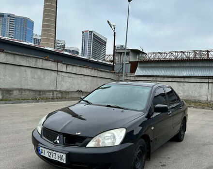 Чорний Міцубісі Lancer, об'ємом двигуна 1.58 л та пробігом 237 тис. км за 3500 $, фото 7 на Automoto.ua
