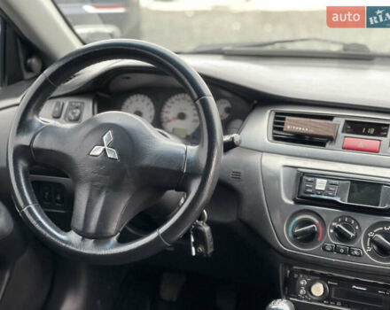 Чорний Міцубісі Lancer, об'ємом двигуна 1.58 л та пробігом 230 тис. км за 3350 $, фото 17 на Automoto.ua