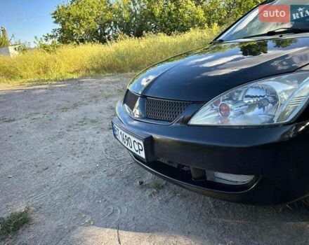 Мицубиси Лансер 2006 в Киеве на Automoto.ua Черный Мицубиси Лансер, объемом двигателя 1.58 л и пробегом 268 тыс. км за 3400 $, фото 6 на Automoto.ua