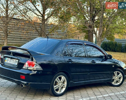 Міцубісі Lancer 2006 у Дніпро (Дніпропетровську) на Automoto.ua Чорний Міцубісі Lancer, об'ємом двигуна 2 л та пробігом 230 тис. км за 4900 $, фото 12 на Automoto.ua