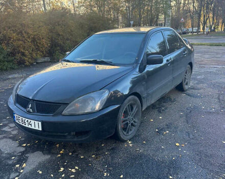 Чорний Міцубісі Lancer, об'ємом двигуна 2 л та пробігом 270 тис. км за 3300 $, фото 2 на Automoto.ua