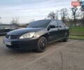 Чорний Міцубісі Lancer, об'ємом двигуна 1.58 л та пробігом 290 тис. км за 3200 $, фото 9 на Automoto.ua