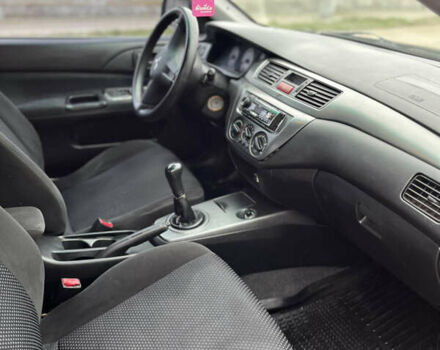 Чорний Міцубісі Lancer, об'ємом двигуна 1.58 л та пробігом 230 тис. км за 3350 $, фото 7 на Automoto.ua