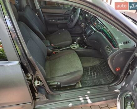 Чорний Міцубісі Lancer, об'ємом двигуна 1.58 л та пробігом 280 тис. км за 3950 $, фото 18 на Automoto.ua