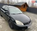 Чорний Міцубісі Lancer, об'ємом двигуна 1.58 л та пробігом 282 тис. км за 4100 $, фото 6 на Automoto.ua