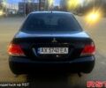 Черный Мицубиси Лансер, объемом двигателя 1.6 л и пробегом 175 тыс. км за 5800 $, фото 3 на Automoto.ua