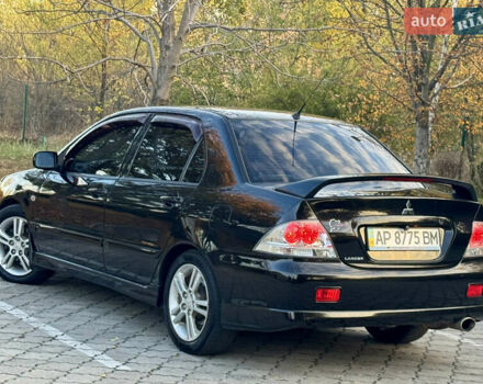 Міцубісі Lancer 2006 у Дніпро (Дніпропетровську) на Automoto.ua Чорний Міцубісі Lancer, об'ємом двигуна 2 л та пробігом 230 тис. км за 4900 $, фото 9 на Automoto.ua