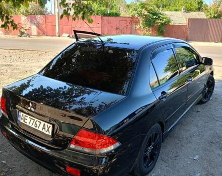 Чорний Міцубісі Lancer, об'ємом двигуна 1.6 л та пробігом 240 тис. км за 5400 $, фото 2 на Automoto.ua