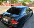 Чорний Міцубісі Lancer, об'ємом двигуна 1.6 л та пробігом 240 тис. км за 5400 $, фото 2 на Automoto.ua