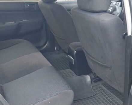 Чорний Міцубісі Lancer, об'ємом двигуна 1.59 л та пробігом 185 тис. км за 4900 $, фото 1 на Automoto.ua