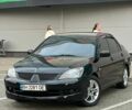Чорний Міцубісі Lancer, об'ємом двигуна 2 л та пробігом 220 тис. км за 4800 $, фото 1 на Automoto.ua