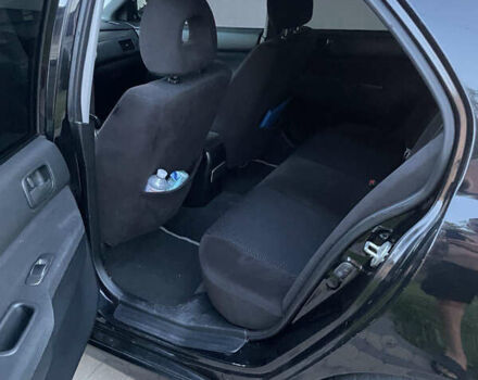 Чорний Міцубісі Lancer, об'ємом двигуна 1.6 л та пробігом 170 тис. км за 4900 $, фото 7 на Automoto.ua