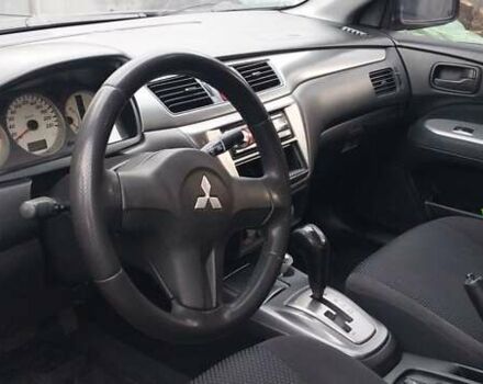Чорний Міцубісі Lancer, об'ємом двигуна 1.59 л та пробігом 185 тис. км за 4900 $, фото 2 на Automoto.ua