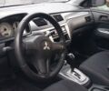Чорний Міцубісі Lancer, об'ємом двигуна 1.59 л та пробігом 185 тис. км за 4900 $, фото 2 на Automoto.ua