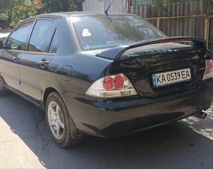 Чорний Міцубісі Lancer, об'ємом двигуна 1.6 л та пробігом 240 тис. км за 3900 $, фото 5 на Automoto.ua