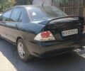 Чорний Міцубісі Lancer, об'ємом двигуна 1.6 л та пробігом 240 тис. км за 3900 $, фото 5 на Automoto.ua