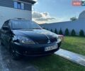 Чорний Міцубісі Lancer, об'ємом двигуна 2 л та пробігом 262 тис. км за 3500 $, фото 1 на Automoto.ua