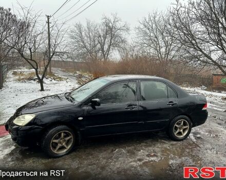 Чорний Міцубісі Lancer, об'ємом двигуна 1.6 л та пробігом 213 тис. км за 4000 $, фото 3 на Automoto.ua