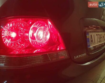 Чорний Міцубісі Lancer, об'ємом двигуна 1.58 л та пробігом 222 тис. км за 2999 $, фото 15 на Automoto.ua