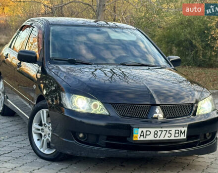 Міцубісі Lancer 2006 у Дніпро (Дніпропетровську) на Automoto.ua Чорний Міцубісі Lancer, об'ємом двигуна 2 л та пробігом 230 тис. км за 4900 $, фото 4 на Automoto.ua