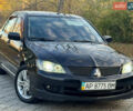 Міцубісі Lancer 2006 у Дніпро (Дніпропетровську) на Automoto.ua Чорний Міцубісі Lancer, об'ємом двигуна 2 л та пробігом 230 тис. км за 4900 $, фото 4 на Automoto.ua