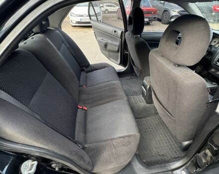 Черный Мицубиси Лансер, объемом двигателя 0 л и пробегом 319 тыс. км за 2700 $, фото 5 на Automoto.ua