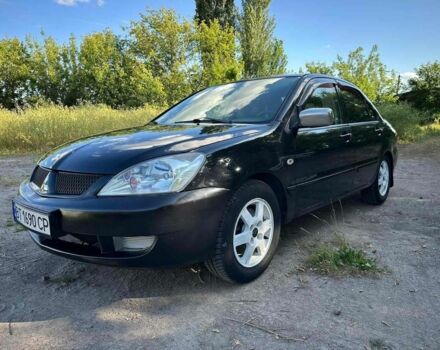 Черный Мицубиси Лансер, объемом двигателя 1.6 л и пробегом 289 тыс. км за 3200 $, фото 15 на Automoto.ua